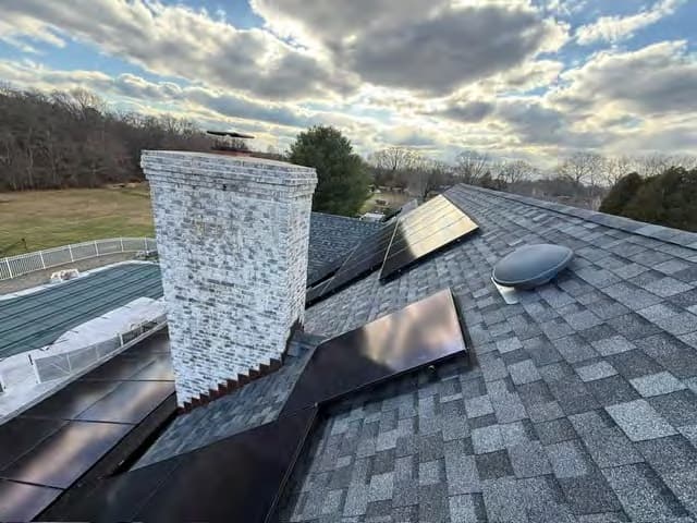 New shingle roof with solar panels installed